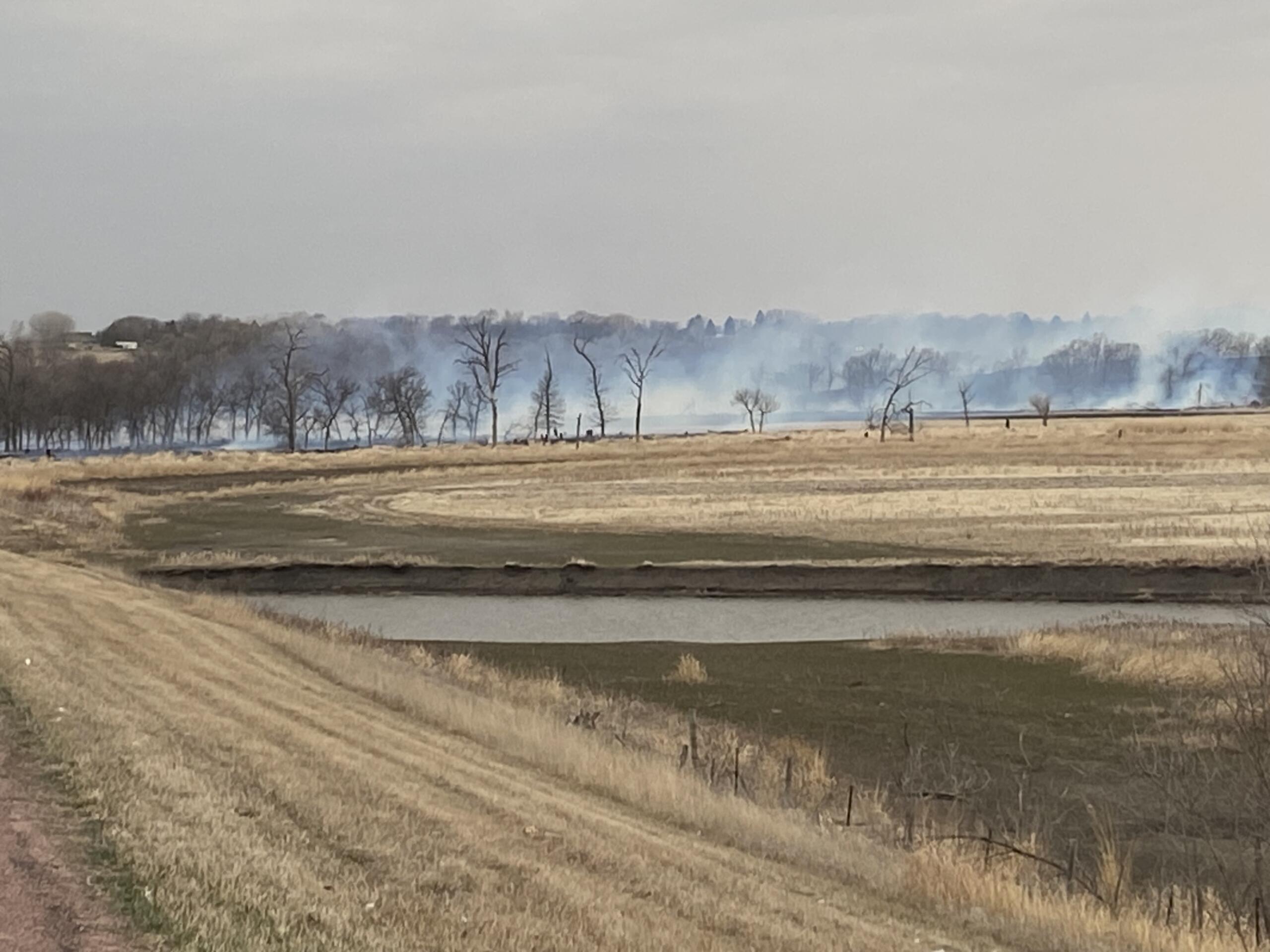 Highway 38 east of Mitchell closed due to multiple grass fires
