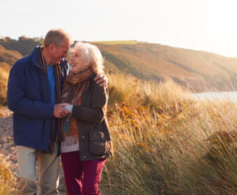 Senior Couple enjoys Walk Through Sand Dunes