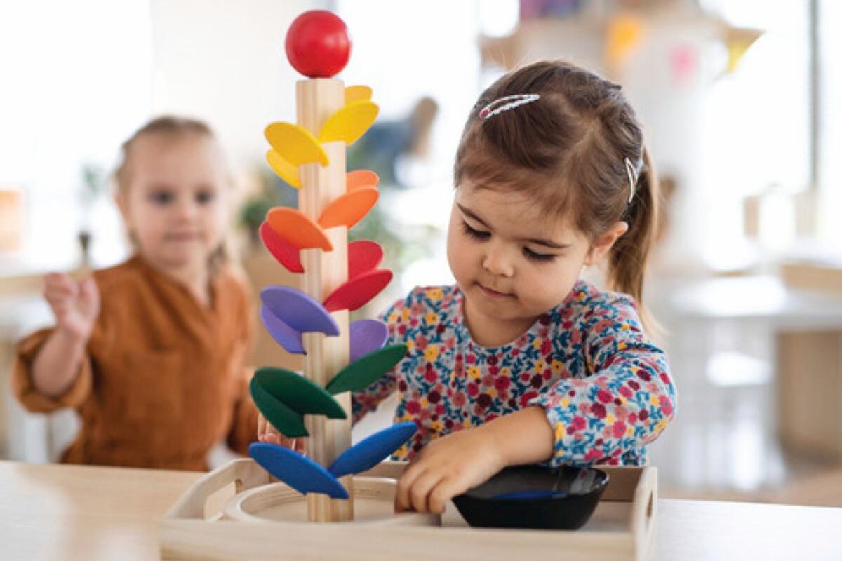 Child playing with educational toy