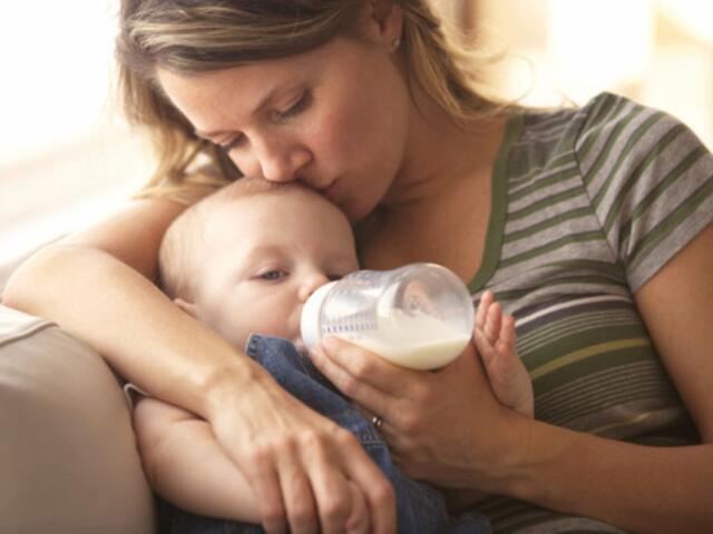 Mother feeding baby