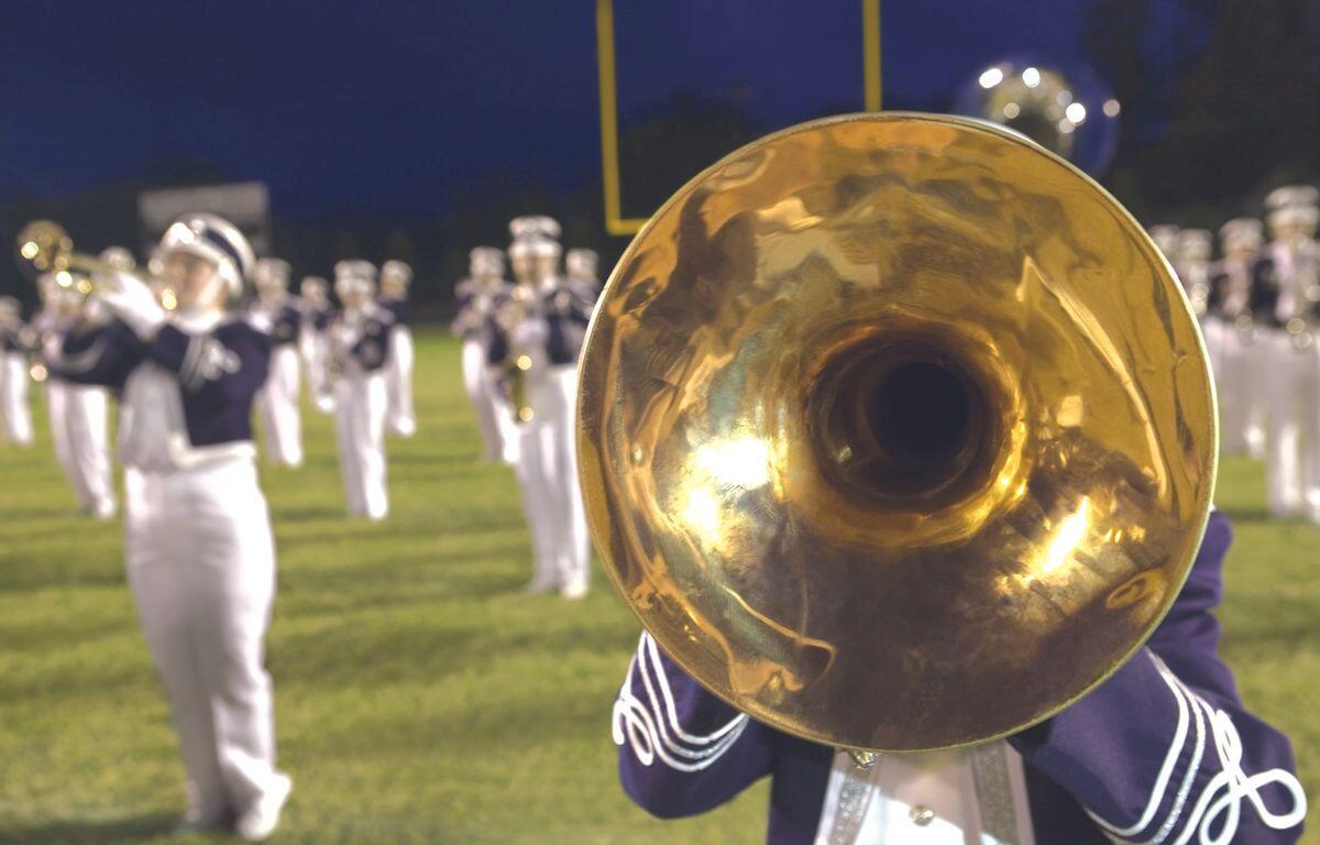 Mitchell High School marching band Pursuit of Excellence marching band competition Mitchell band Desperado show Mitchell marching band second place best color guard Mitchell High School new marching band director Mitchell Mitchell marching band homecoming performance Marshall Minnesota band competition results high school marching band competitions 2025 Mitchell band Iowa competition October 4