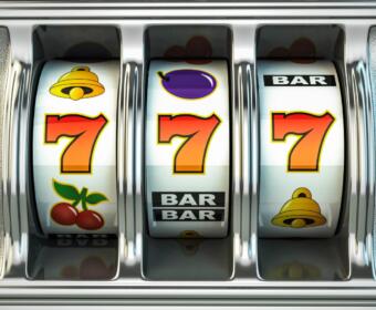 South Dakota slot machine law illegal gaming devices SD SDCL 22-25-13 slot machines South Dakota Commission on Gaming slot machine possession prohibited Class 1 misdemeanor South Dakota antique slot machine exemption gaming law enforcement SD unlicensed slot machines seized South Dakota gambling regulations
