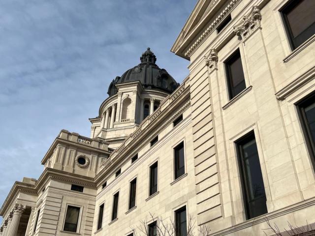 South Dakota Medicaid expansion repeal Medicaid expansion South Dakota HJR 5002 South Dakota House Joint Resolution 5002 South Dakota House State Affairs Committee South Dakota House committee vote 8-4 2026 ballot South Dakota Medicaid constitutional amendment South Dakota Medicaid South Dakota Legislature Medicaid debate SD lawmakers Medicaid expansion repeal Rep. Aaron Aylward Aaron Aylward Harrisburg South Dakota Medicaid budget pressure Legislative Research Council Medicaid costs Medicaid expansion cost South Dakota federal government 90 percent Medicaid 138 percent federal poverty level Medicaid South Dakota Amendment D Medicaid AARP South Dakota Medicaid expansion Erik Nelson AARP South Dakota Avera Health Medicaid expansion Kim Malsam-Rysdon Avera rural hospitals South Dakota Medicaid healthcare providers oppose repeal