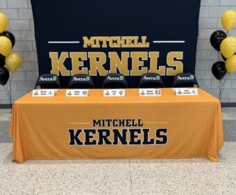 Mitchell High School National Letter of Intent Signing Day Mitchell High School Signing Day Feb. 4, 2026 MHS Commons signing day 3:20 p.m. Mitchell SD student-athletes signing day National Letter of Intent Mitchell SD Avrie London Dakota State track and field Taylor DeJong Dickinson State track and field Tyler Christensen Dakota Wesleyan baseball Adam Kampshoff Dakota Wesleyan soccer Hunter Patton Mount Marty track and field Mitchell High School athletics college commitments South Dakota high school signing day Mitchell Kernels college signings Mitchell SD sports recruiting news South Dakota college athletics commitments