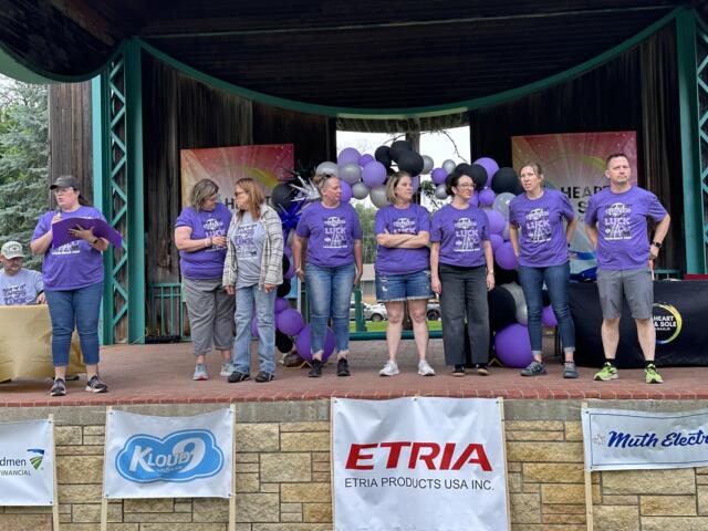 Heart and Sole Cancer Walk organizers on stage at the Hitchcock Park Bandshell.