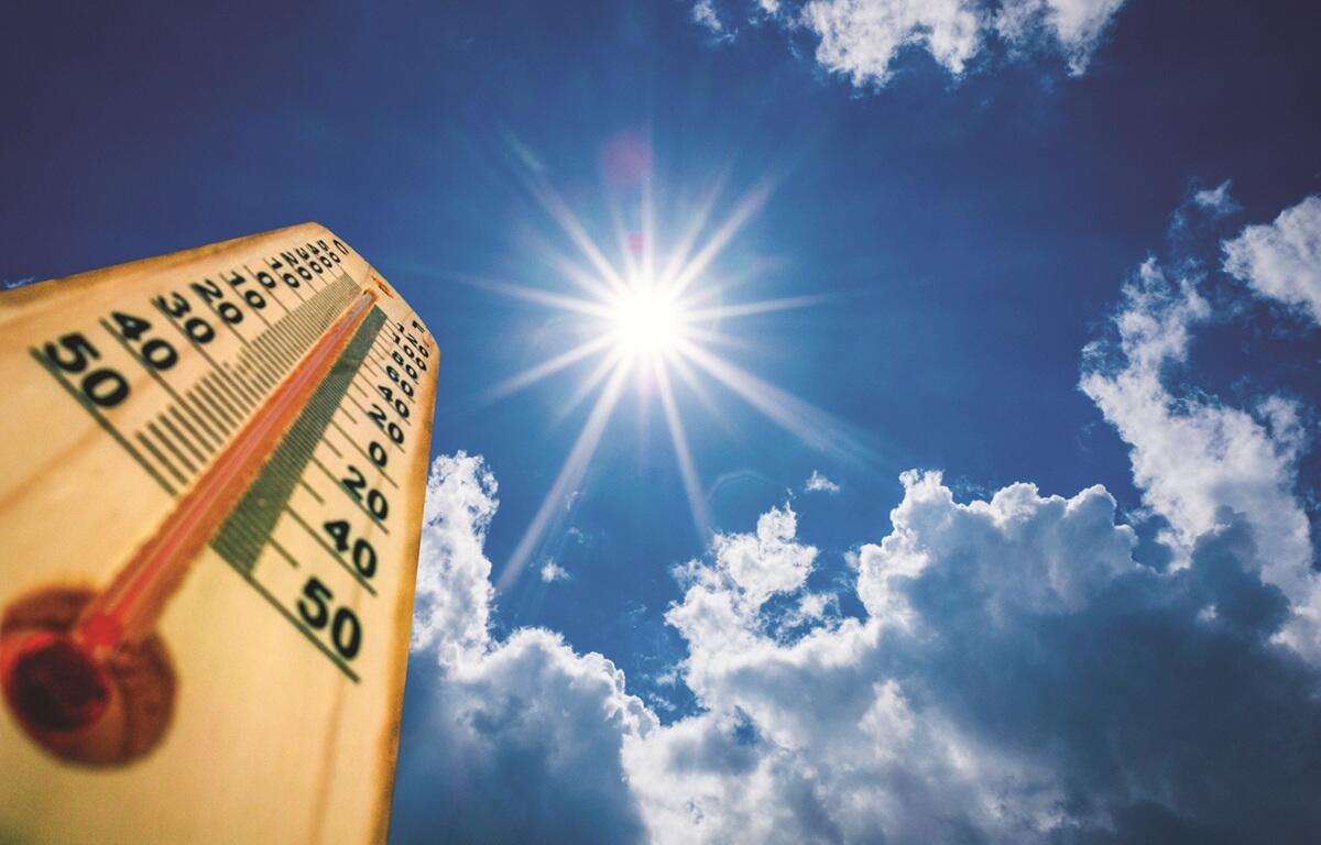 Sun beating down on a thermometer