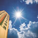 Sun beating down on a thermometer