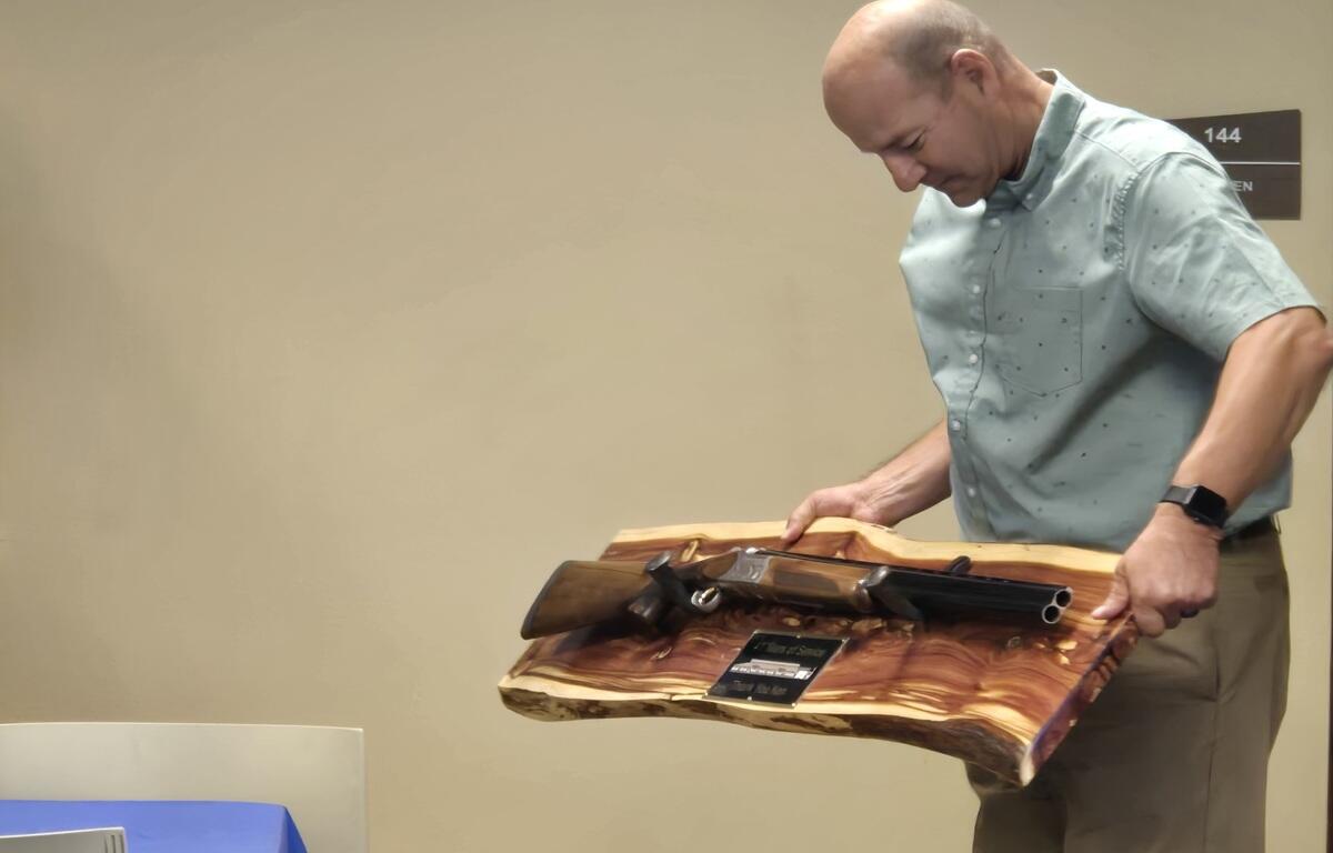 Ken Schlimgen was awarded a trap gun and wall mount at his retirement party on June, 26, 2026.