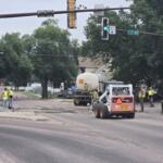 Crews working at East 1st Avenue and Burr on July 30, 2026