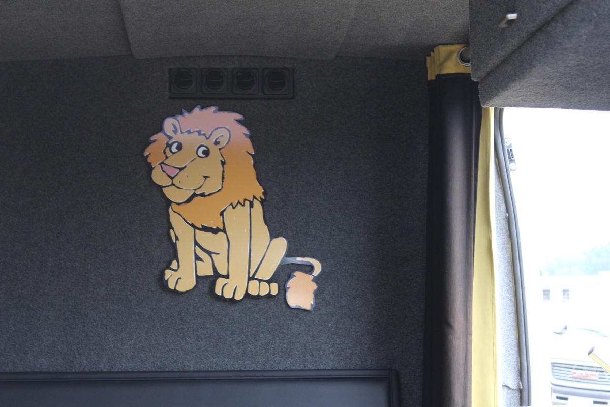 Cute lion decor inside vision van.