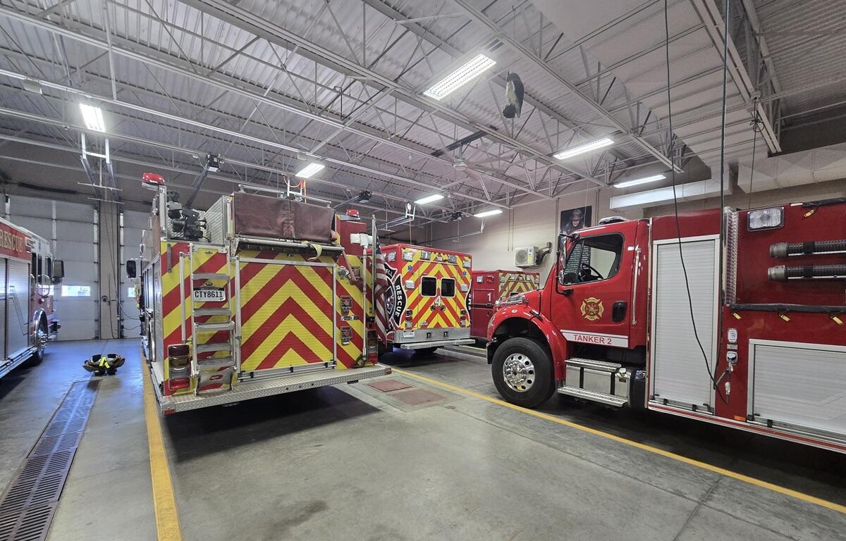 Fire trucks inside the bay at the Mitchell Public Safety Building, downtown.