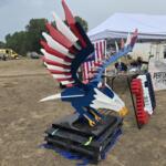 Performance Pet Products' winning float, an American bald eagle in red, white, and blue, on display at Family Fun Day at the Rodeo Grounds.