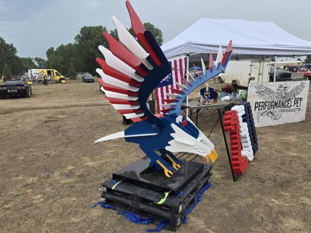 Performance Pet Products' winning float, an American bald eagle in red, white, and blue, on display at Family Fun Day at the Rodeo Grounds.