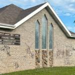View of full graffiti at Woniya Wakan - Holy Spirit Episcopal Church in Wagner