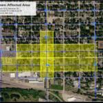Aerial map with blue street grid and a yellow highlighted block area labeled 'Water Shutdown Affected Area,' showing the water shutoff zone over streets and avenues.