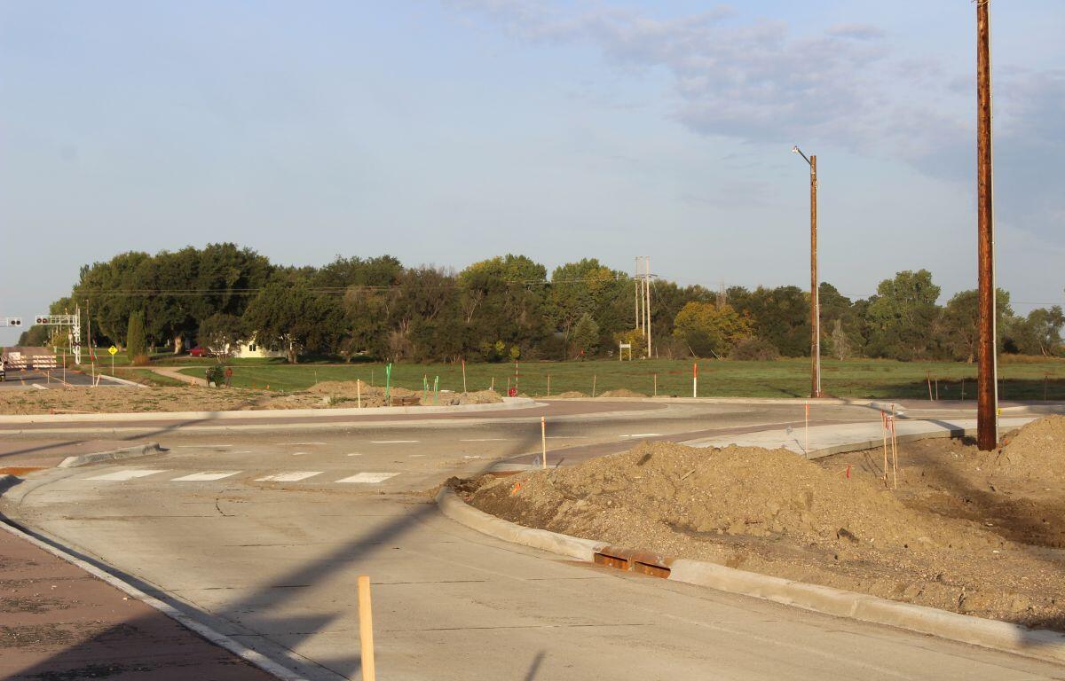 The roundabout now features paved asphalt